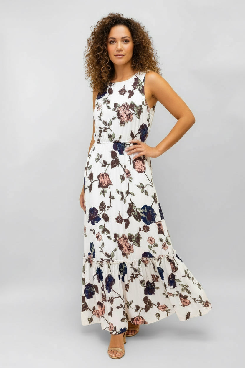 Woman wearing a floral dress on a gray background