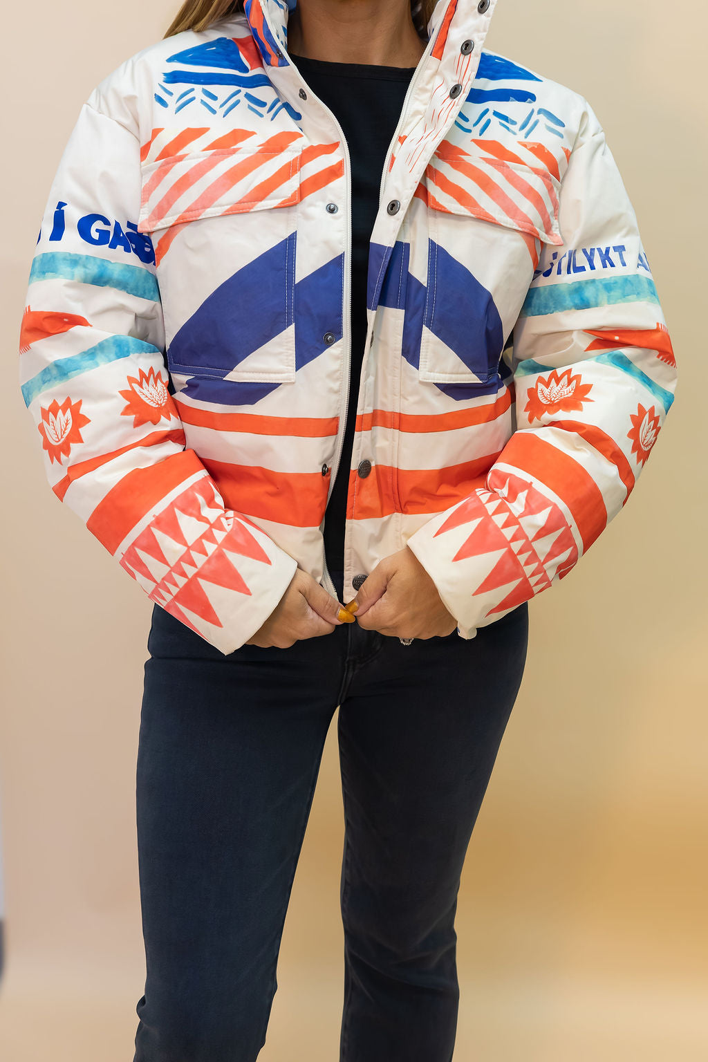 Colorful jacket with geometric patterns on a blurred background